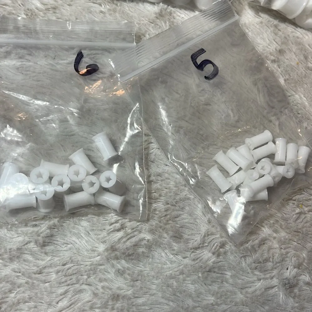 Star gauge plugs multiple sizes available white